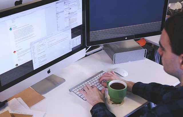 professional team workspace with laptops Toronto